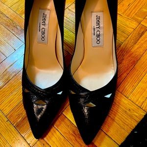 Jimmy Choo black heels only worn a few times.  Great condition
